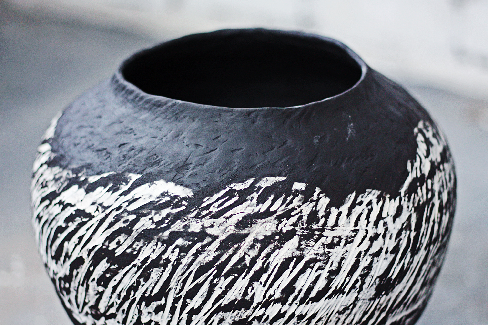 Collection of finished ceramic pieces on a wooden table