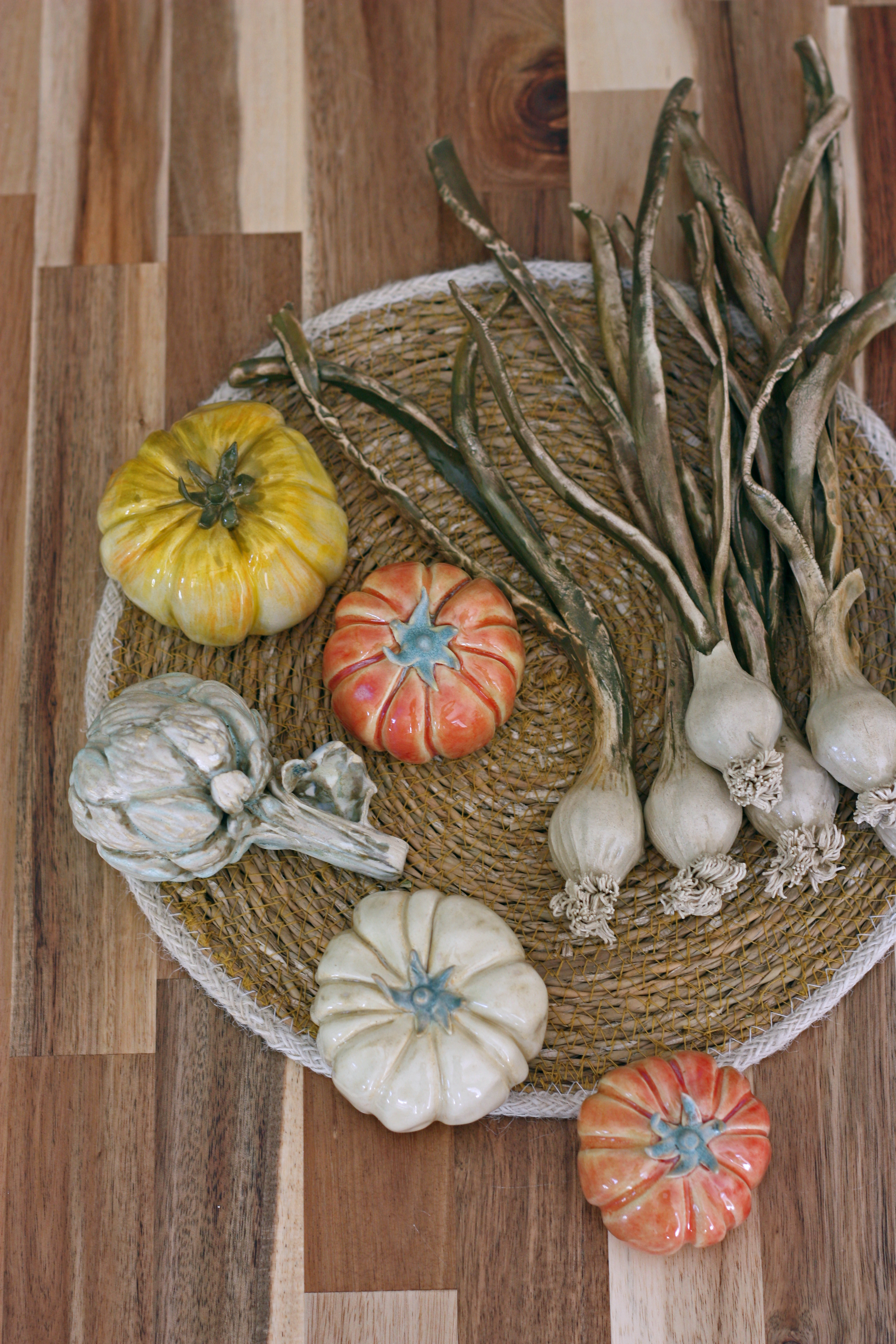 Layered ceramic sculpture with carved details